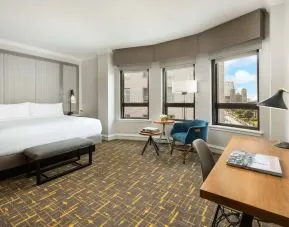 Spacious king room with natural light at Stanford Court San Francisco.