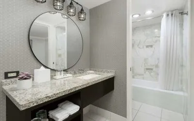 Private guest bathroom with bath and shower at Stanford Court San Francisco.