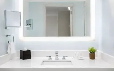 Well-lit guest bathroom with shower at Courtyard Boston Cambridge.