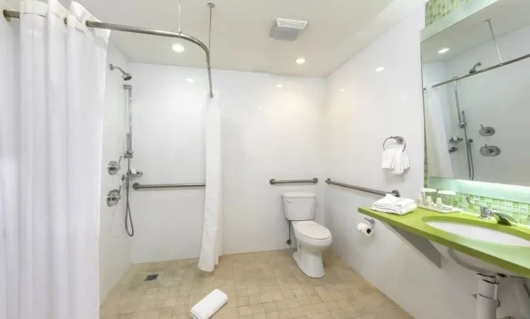 Private guest bathroom with shower at Circa 39 Hotel.