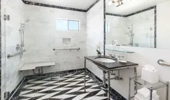 Guest bathroom with shower at Maison 140 Beverly Hills.