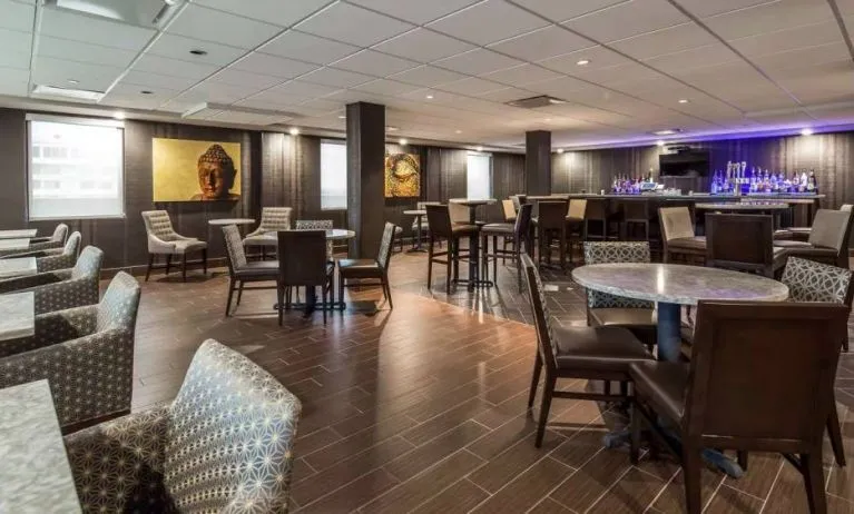 Dining area perfect for coworking at Best Western Premier NYC Gateway.