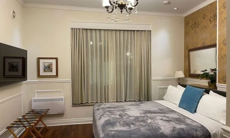 Day use room with TV and air conditioning at Parc Suites Hotel.