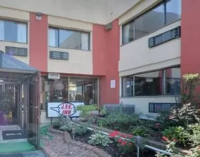 Hotel exterior at JFK INN.