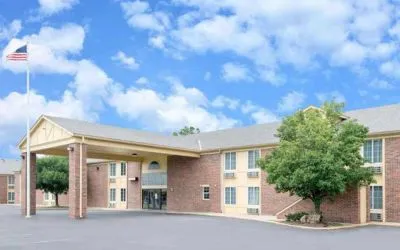 Hotel exterior at Coratel Inn & Suites By Jasper Newton.