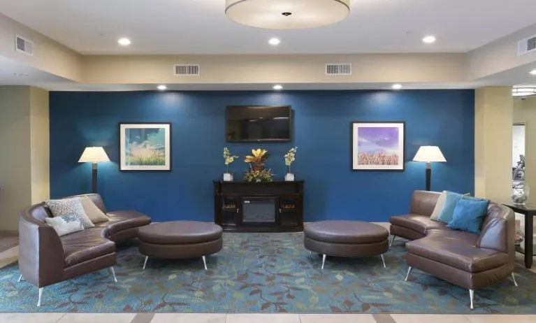 Lobby and coworking lounge at Candlewood Suites Odessa.