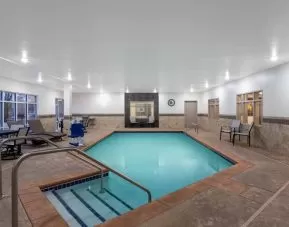 Refreshing indoor pool at AmericInn By Wyndham Sioux Falls North.