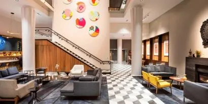 Lobby and coworking space with fire place at Le Méridien Columbus, The Joseph.
