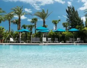 Stunning outdoor pool at Home2 Suites By Hilton Cape Canaveral Cruise Port.