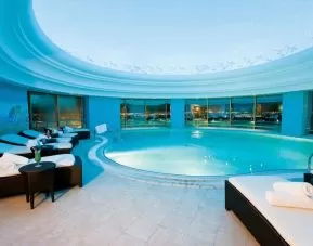Stunning indoor pool at Millennium Hotel Doha.