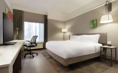 Spacious king room with work desk at Hilton Garden Inn Calgary Downtown.
