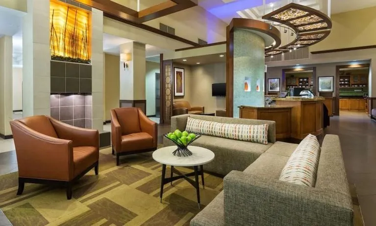 Lobby and coworking lounge at Hyatt Place Fort Lauderdale Cruise Port.
