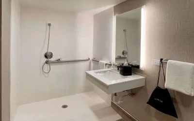 Guest bathroom with shower at Sleep Inn Oakbrook Terrace.