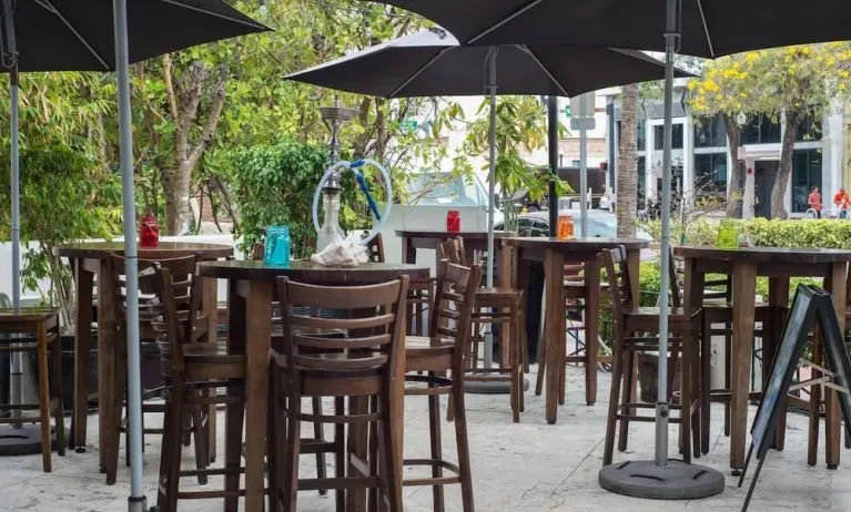 Hotel terrace with seating area at Hotel Chelsea, A South Beach Group Hotel.