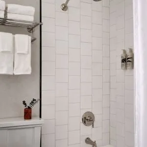 Private guest bathroom with shower at Romer Hell's Kitchen.
