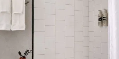 Private guest bathroom with shower at Romer Hell's Kitchen.
