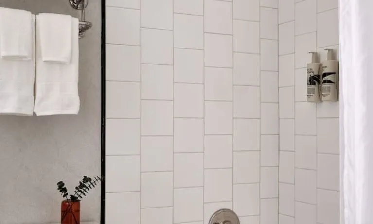 Private guest bathroom with shower at Romer Hell's Kitchen.