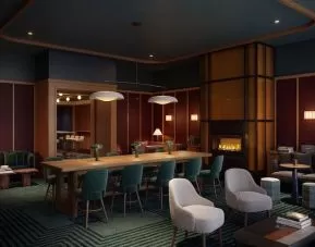 Lobby lounge area and workspace at Romer Hell's Kitchen.
