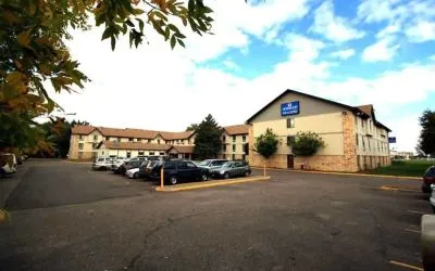 Parking area available at Norwood Inn & Suites - Roseville.