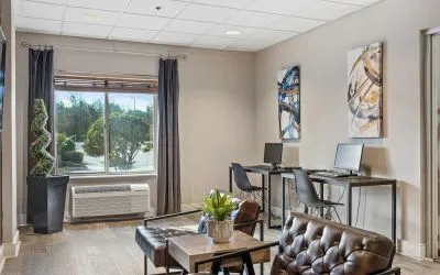 Business center with PC, internet, and printer at OYO Townhouse Orlando West.