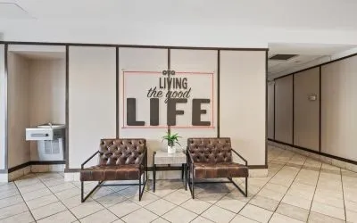 Lobby and coworking space at OYO Townhouse Orlando West.
