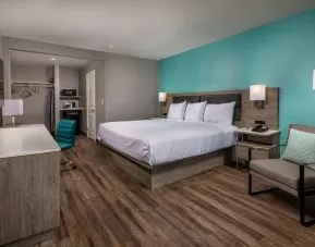 King bed at Travelodge LAX By Wyndham.