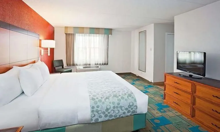 King room with private bathroom at Norwood Inn & Suites Merrillville.