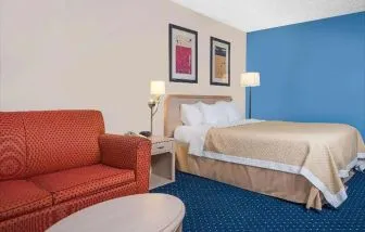 Day use room with living area at Norwood Inn & Suites La Crosse.