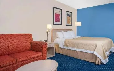 Day use room with living area at Norwood Inn & Suites La Crosse.