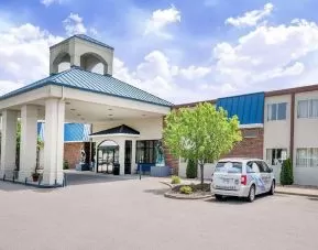 Hotel exterior and parking area at Norwood Inn & Suites La Crosse.