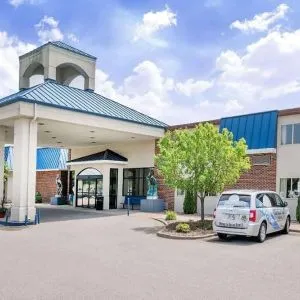 Hotel exterior and parking area at Norwood Inn & Suites La Crosse.