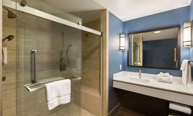 Private guest bathroom with shower at Hilton Garden Inn Houston NW/Willowbrook.