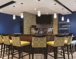 Hotel bar with lounge seating at Hilton Garden Inn Houston NW/Willowbrook.