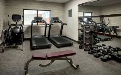 The hotel’s fitness center has treadmills, an elliptical machine, bench, and assorted free weights.