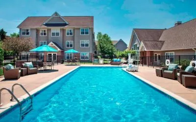 The hotel’s outdoor pool has armchairs and shaded tables/chairs nearby, and is equipped with a lift.