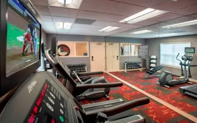 Sonesta ES Suites Allentown Bethlehem Airport’s fitness center has a variety of exercise machines in addition to rows of free weights.