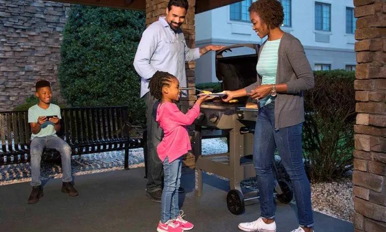 Sonesta ES Suites Charlotte Arrowood’s outdoor barbecue and picnic area offers outdoor dining, under cover, for guests.