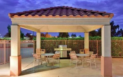 Sonesta Simply Suites Phoenix Tempe’s gazebo features barbecue facilities next to which are tables and chairs where guests can dine and socialize.