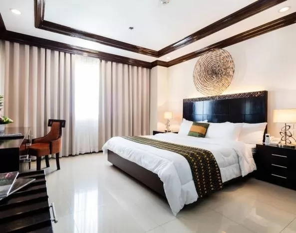 Day room with natural light at Apo View Hotel.