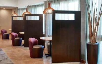 The hotel’s media pods are cozy nooks for socializing or co-working, with comfy seats and coffee tables by the windows.
