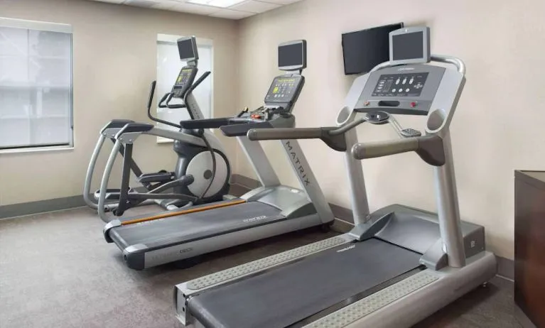 The hotel’s fitness center is equipped with various types of exercise machine, and has a wall-mounted television.