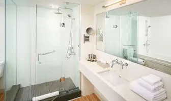 Guest bathroom with showerr at Novotel Toronto Vaughan Centre.