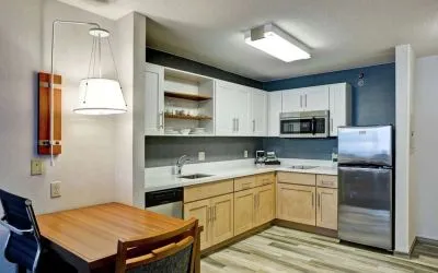 In-room kitchen at Homewood Suites By Hilton Chicago-Downtown.