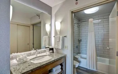 Private bathroom at Homewood Suites By Hilton Chicago-Downtown.