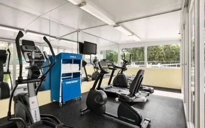 Fitness center at EnVision Hotel Miami International Airport.