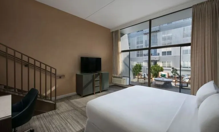 Spacious king room with balcony at Hotel Dena, Pasadena Los Angeles.