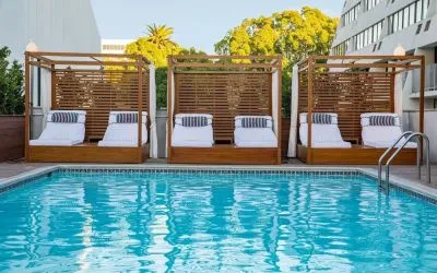 Pool cabanas and pool chairs at Hotel Dena, Pasadena Los Angeles.