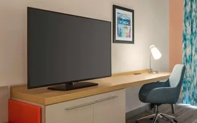 Delux king room with TV and work desk at Hilton Garden Inn Nashville West End Avenue.