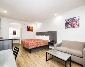 Day use room with TV and work station at Palace Inn 290 & Fairbanks.
