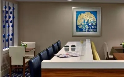 Cozy bar and coworking space at Sonesta ES Suites Cincinnati - Blue Ash.